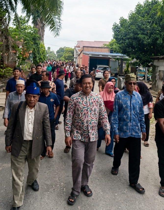 Diarak Ratusan Warga, Nanang Helmanto Daftar Kembali sebagai Calon Kades Lalang Kabung