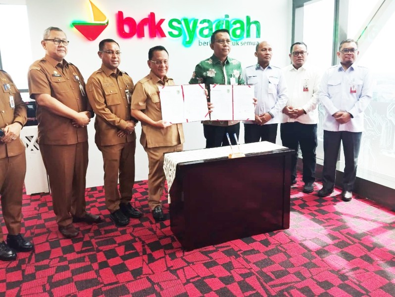 Bupati Bistamam Teken MoU Layanan Keuangan ASN Berbasis Syariah
