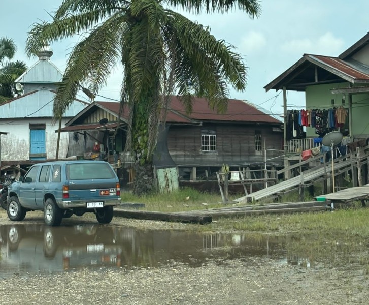 Air Sungai Kampar Mulai Surut, Warga Pinggiran Sungai Diimbau Tetap Waspada