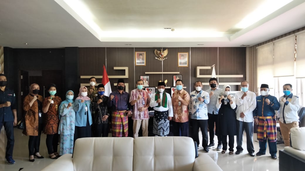 Bupati Pelalawan Bersama BPJS Ketenagakerjaan Serahkan Bantuan CSR Jaminan Sosial