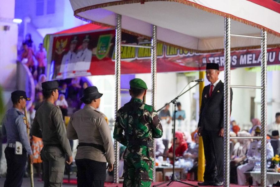 Pawai Obor Malam Renungan Suci, Bupati Rohil: Teruslah Melaju Untuk Indonesia Maju