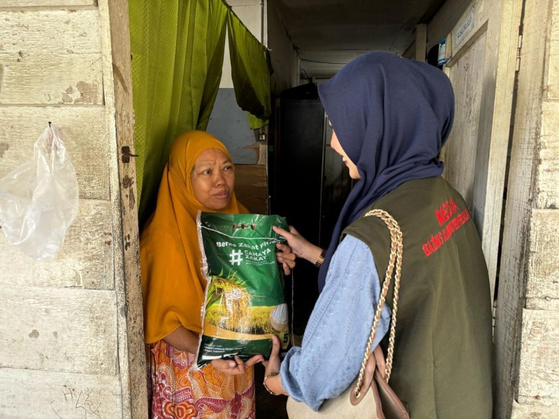 BAZNAS Pelalawan Salurkan Beras Zakat Fitrah Ramadhan ke Beberapa Desa di Kabupaten Pelalawan