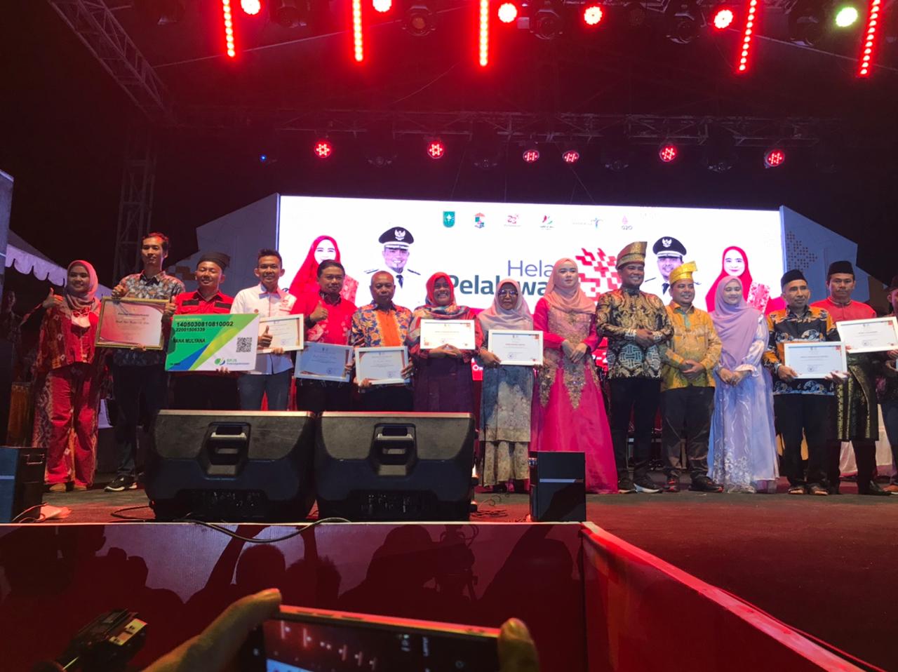 Dihelat Pelalawan Ke-23, 100 UMKM Terima Kartu Perlindungan Jaminan Sosial Ketenagakerjaan